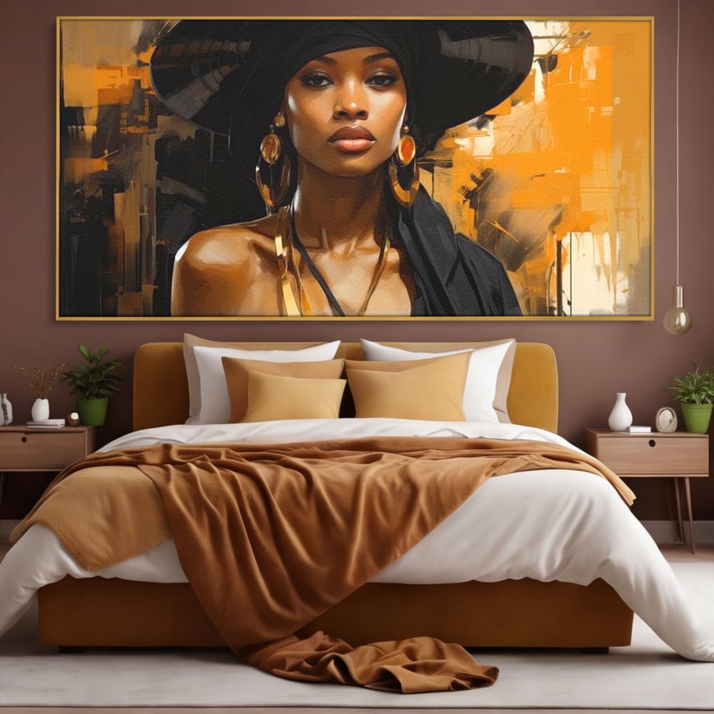 Tablou canvas cu tablou canvas cu femeie in palarie neagra, in rama de aluminiu auriu, pe perete intr-un dormitor